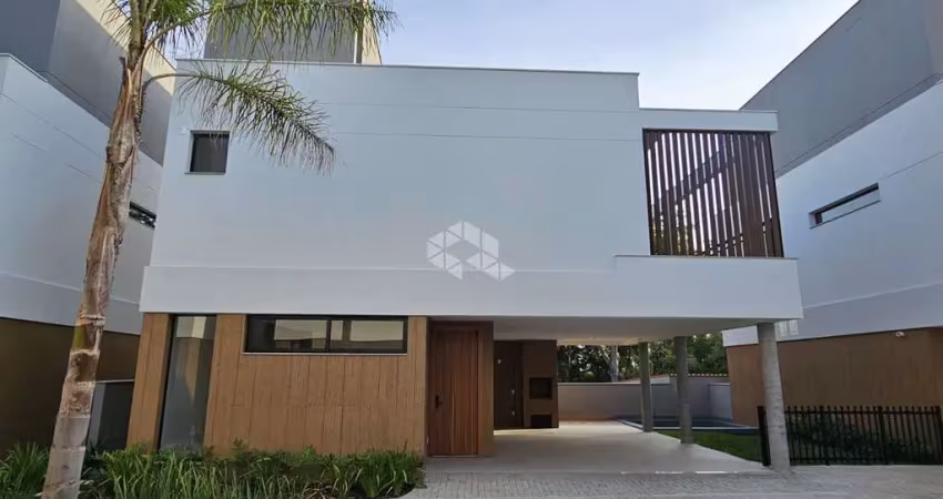 Casa residencial com 3 suítes em condomínio fechado no bairro cacupé, florianópolis-sc