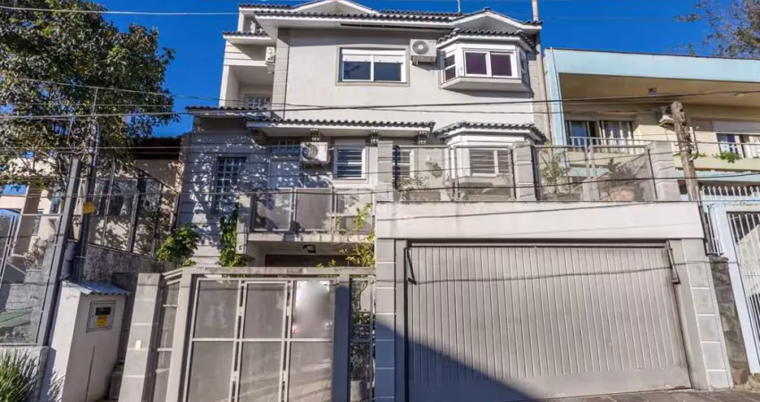 Casa com 4 quartos à venda na Bortolo Barbieri, 67, Jardim São Pedro, Porto Alegre