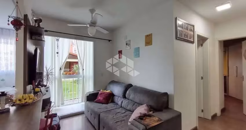 Apartamento de 2 dormitórios, living 2 ambientes, com sacada, cozinha com área de serviço no bairro fátima-canoas