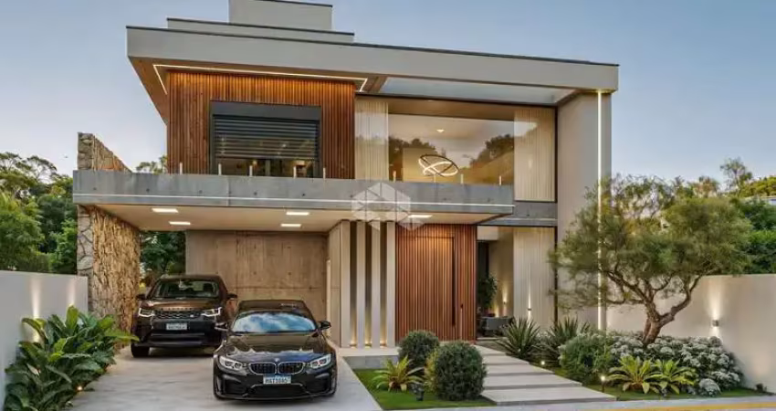 Sobrado alto padrão com 4 suítes, 265m² construído, 4 vagas de carro, ao lado park shopping canoas, bairro moinhos de vento