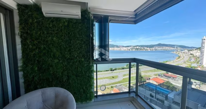 Apartamento com vista para o mar SEMIMOBILIADO com 3 dormitórios, sendo 3 suítes, 3 vagas de garagem, hobby box no bairro Estreito em Florianópolis/SC