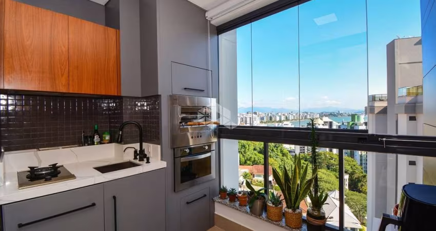 APARTAMENTO COM 2 QUARTOS SENDO 1 SUÍTE 2 VAGAS DE GARAGEM E VISTA MAR NO BAIRRO AGRONÔMICA FLORIANÓPOLIS/SC