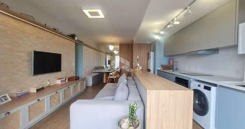 APARTAMENTO SEMIMOBILIADO COM 3 QUARTOS SENDO 1 SUÍTE E 1 VAGA DE GARAGEM EM BARREIROS SÃO JOSÉ/SC