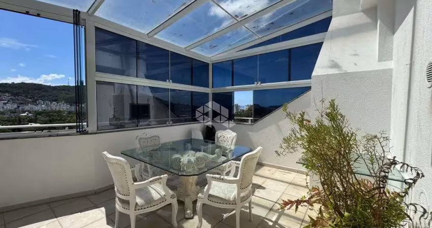 APARTAMENTO SEMIMOBILIADO COM 2 QUARTOS SENDO 1 SUÍTE E 2 VAGAS DE GARAGEM NO BAIRRO CÓRREGO GRANDE EM FLORIANÓPOLIS/SC