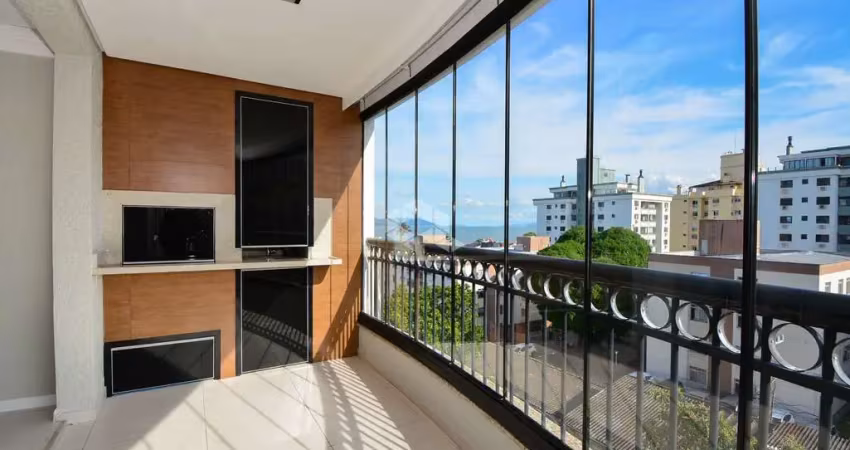APARTAMENTO COM VISTA MAR SEMIMOBILIADO COM 3 QUARTOS SENDO 1 SUÍTE 2 VAGAS DE GARAGEM NO BAIRRO COQUEIROS EM FLORIANÓPOLIS/SC