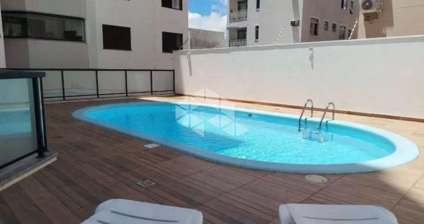 APARTAMENTO SEMIMOBILIADO COM 3 QUARTOS SENDO 1 SUÍTE 1 VAGA DE GARAGEM E HOBBY BOX NO BALNEÁRIO EM FLORIANÓPOLIS