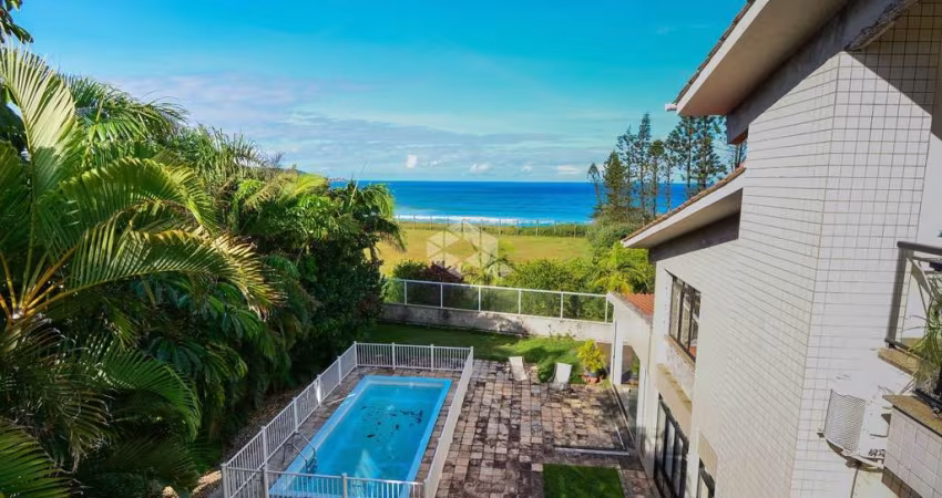 CASA DE ALTO PADRÃO COM 6 QUARTOS SENDO 4 SUÍTES 4 VAGAS DE GARAGEM VISTA PARA O MAR NO MORRO DAS PEDRAS FLORIANÓPOLIS