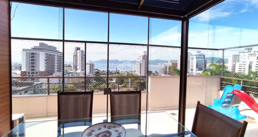 COBERTURA COM 3 QUARTOS SENDO 1 SUÍTE VISTA MAR E TERRAÇO NO CANTO EM FLORIANÓPOLIS