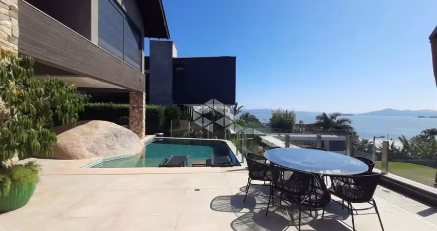 Casa 4 suítes no cacupé florianópolis com piscina vista para o mar e 5 vagas de garagem