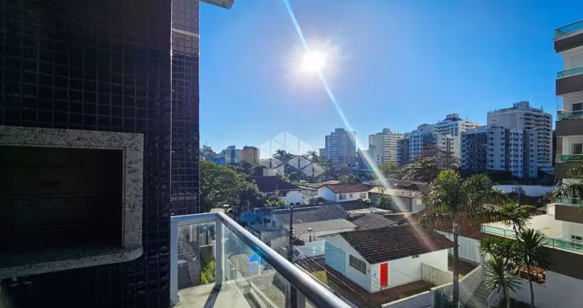 Apartamento 2 quartos sendo 1 suíte duas vagas e sacada com churrasqueira no itacorubi florianópolis