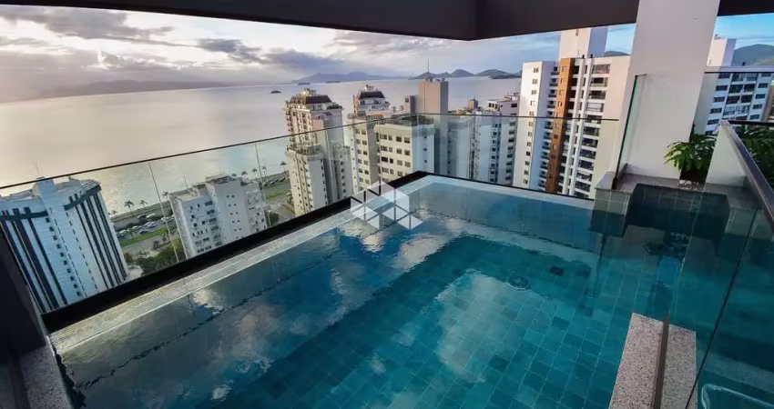 Apartamento à venda em florianópolis com 2 suítes 1 vaga de garagem e vista parcial mar