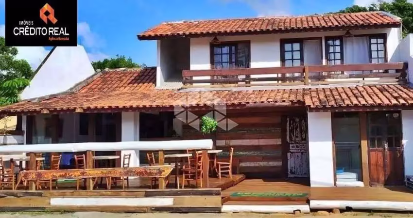 Pousada na Avenida Principal da Praia da Ferrugem