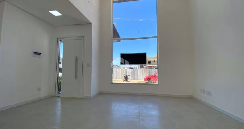 Casa com 3 dormitórios, sendo uma suíte, sala estar em condomínio fechado
