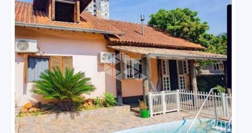 Casa de 3 dormitórios, próxima ao parcão de Gravataí, com piscina
