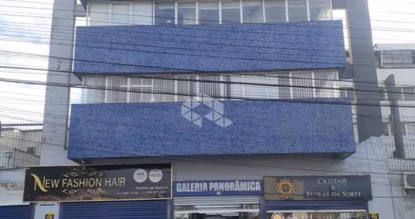 Sala comercial à venda com 21m² em galeria comercial no centro de Guaíba