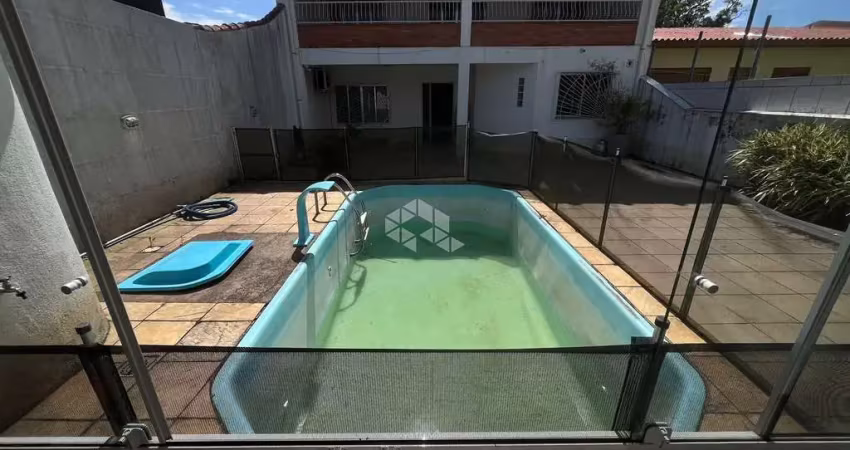 Casa à venda com 3 quartos e 2 vagas no centro de Guaíba