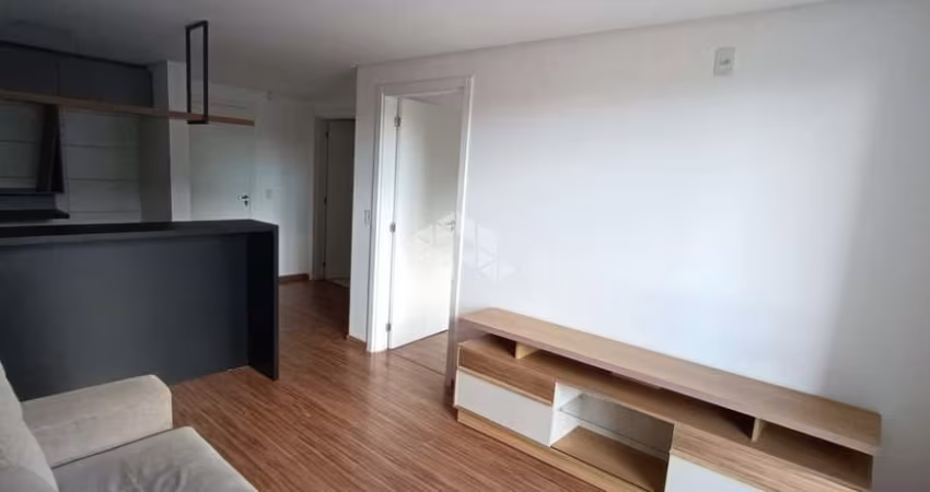 Apartamento com 1 dormitório com sacada e semi mobiliado