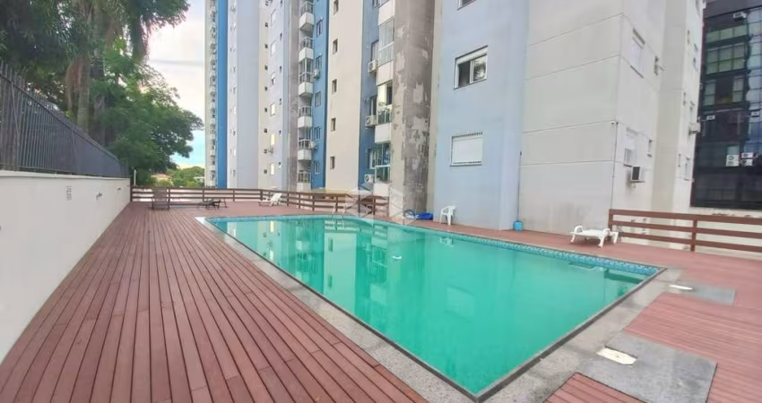 Apartamento 2 dormitórios com sacada e churrasqueira, centro de Canoas/RS.