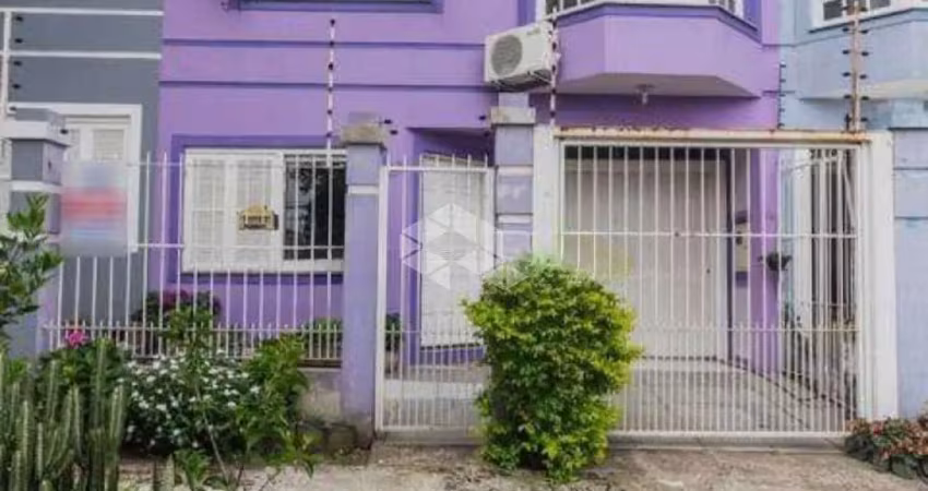 Casa com 3 quartos à venda na Rua Santo Camaratta Santino, 186, Parque Santa Fé, Porto Alegre