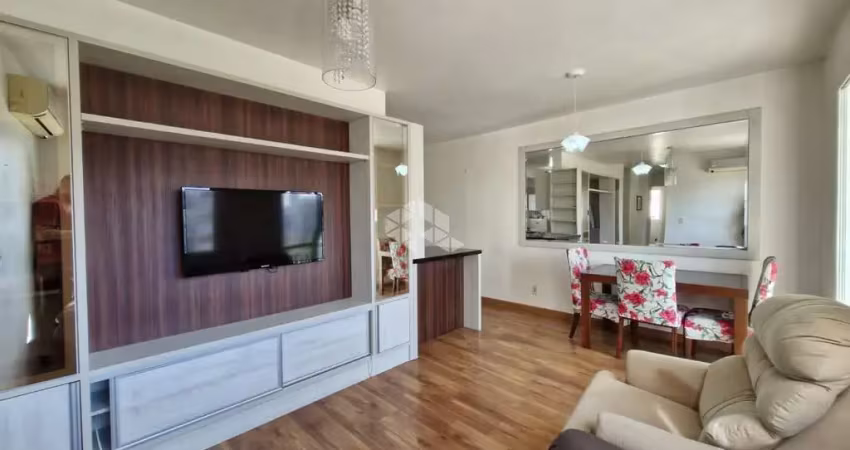 Apartamento de 3 dormitórios e 1 vaga de garagem no bairro Huamitá, em Porto Alegre.