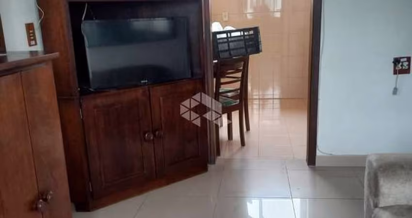Apartamento semimobiliado com vaga e ótima localização