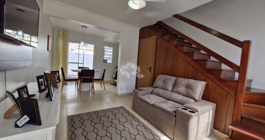 Casa em condomínio 2 dormitórios, semimobiliada,1 vaga de garagem, no bairro Humaitá