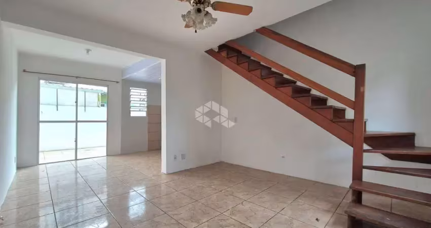 Casa em condomínio com 2 dormitórios e 1 vaga de garagem, no bairro humaitá, em porto alegre.