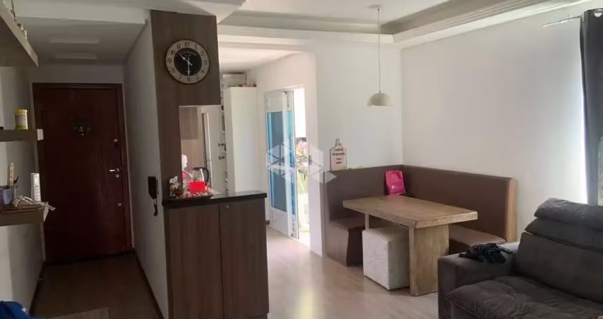 Apartamento semi-mobiliado à venda no pagani - palhoça/sc com 2 dormitórios, suíte e sacada com churrasqueira