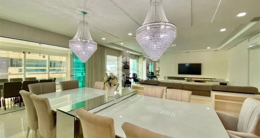 Apartamento com 4 suítes e 3 vagas de garagem na Meia Praia em Itapema