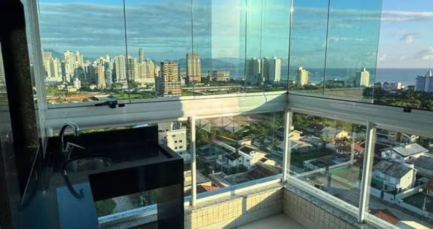 Apartamento com vista mar e finamente mobiliado no Perequê com duas suítes e 2 vagas de garagem