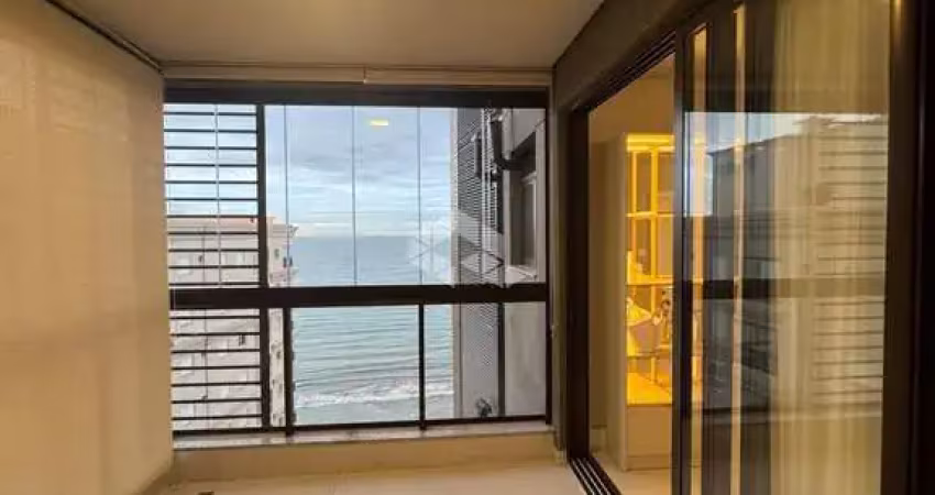 Apartamento com 3 suítes e duas vagas de garagem em porto belo com vista mar mobiliado