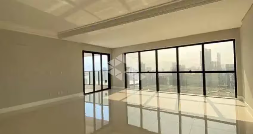 Apartamento com 4 suítes e 4 vagas de garagem em itapema com vista mar