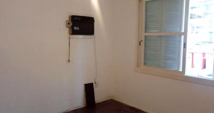 Apartamento térreo dois dormitórios vaga rotativa.