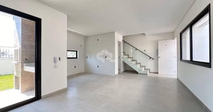 CASA GEMINADA 3 DORMITÓRIOS SENDO UMA SUÍTE COM VARANDA QUINATL COM CHURRASQUEIRA 1 VAGA DE GARAGEM NOVA PALHOÇA/SC