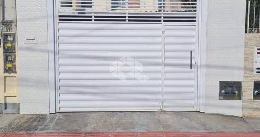 CASA GEMINADA 2 DORMITÓRIOS SEMI MOBILIADA 1 VAGA DE GARAGEM FORQUILHAS SÃO JOSÉ/SC