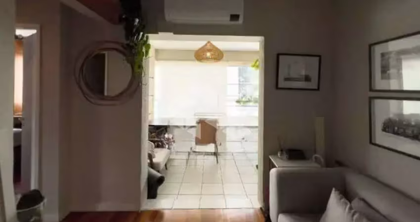 Apartamento à venda na vila olímpia com 72m², 2 dormitórios sendo 1 suíte e 1 vaga de garagem.  o imóvel conta com sala para 2 ambientes com ar-condi