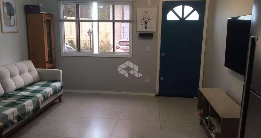 CASA EM CONDOMÍNIO 2 QUARTOS E 1 VAGA DE GARAGEM NO BAIRRO CAVALHADA