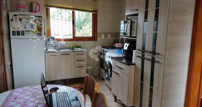 Apartamento à venda com 1 dormitório e 1 vaga de garagem no bairro Cidade Baixa