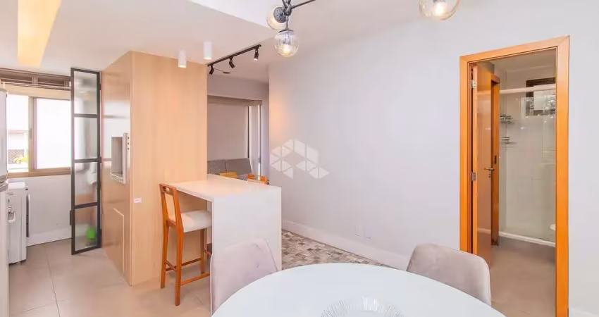 Apartamento 1 dormitório com garagem , elevador, suíte , parte alta do bairro