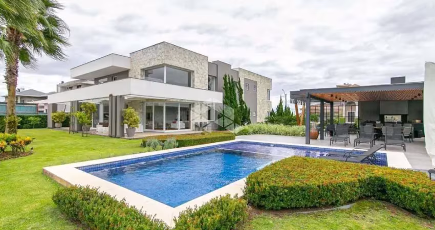 Casa a venda no condomínio eldorado ilhas park com quatro suítes.