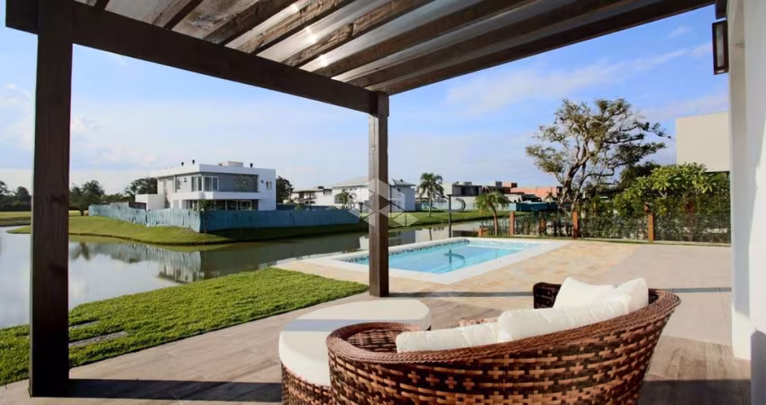 CASA NO CONDOMÍNIO ILHAS PARK COM CINCO SUITES E  ACESSO AO RIO