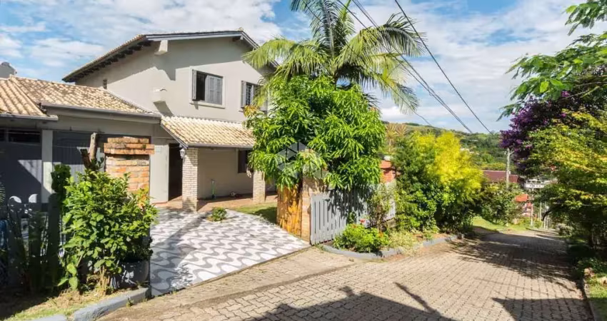 Casa em condomínio fechado com 3 quartos à venda na Estrada João Passuelo, 1060, Vila Nova, Porto Alegre