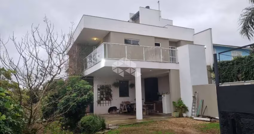 Casa em condomínio fechado com 3 quartos à venda na Rua Amapá, 1600, Vila Nova, Porto Alegre