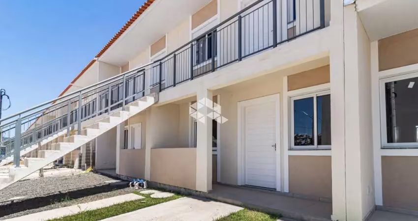 Casa condomínio 2 dormitórios pátio churrasqueira 1 garagem