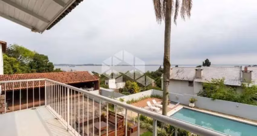 Casa em condomínio fechado com 5 quartos à venda na Rua Simão Bolívar, 341, Vila Conceição, Porto Alegre
