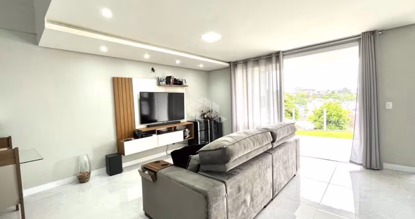 Casa 3 dormitórios, sendo 1 suíte, sala e cozinha integradas, lavabo, 2 vagas. ACEITA FINANCIAMENTO E FGTS no Bairro Guarani em Novo Hamburgo.