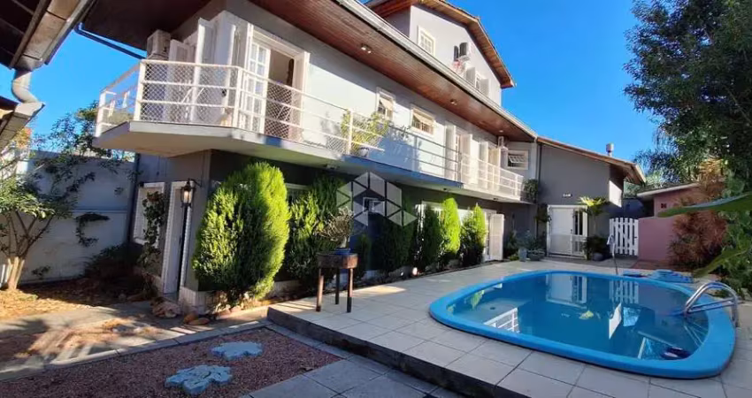 Casa com 4 quartos à venda na Rua José Pedro de Moura, 39, Jardim Isabel, Porto Alegre