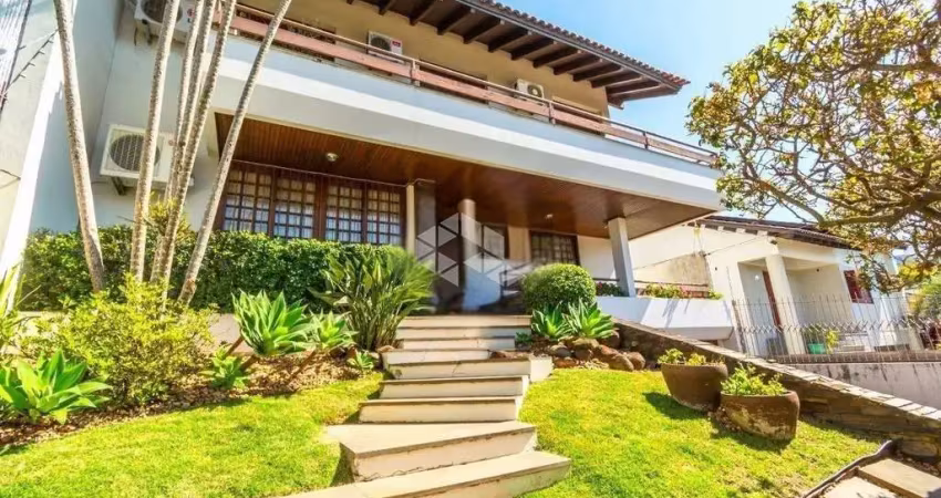 Casa com 4 quartos à venda na Rua Matias José Bins, 777, Três Figueiras, Porto Alegre