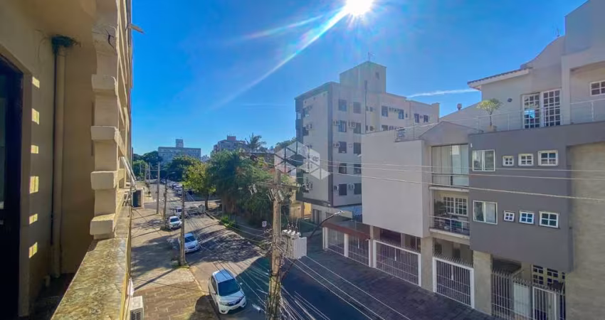 Apartamento 2 dormitórios, sacada frontal, sol norte, 60 m², bairro Petrópolis, Porto Alegre