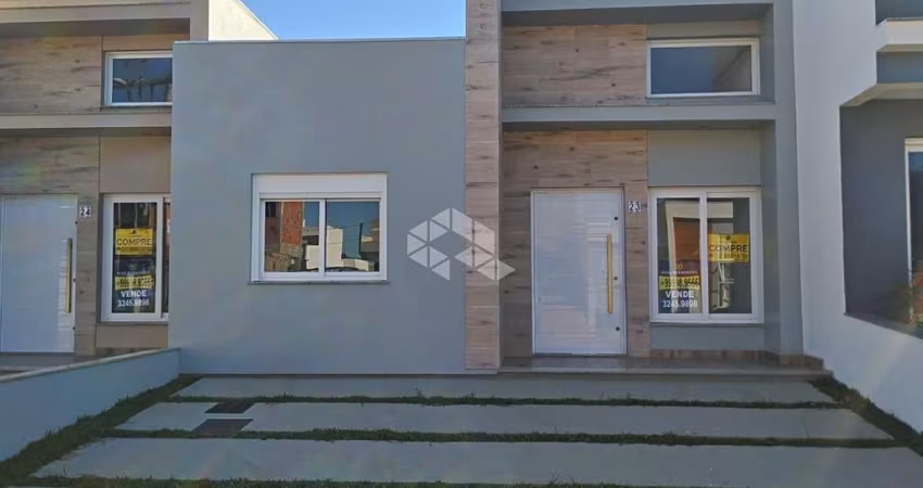 Casa á venda, com 2 dormitórios, 2 vagas no bairro hípica , zona sul de Poa -Rs